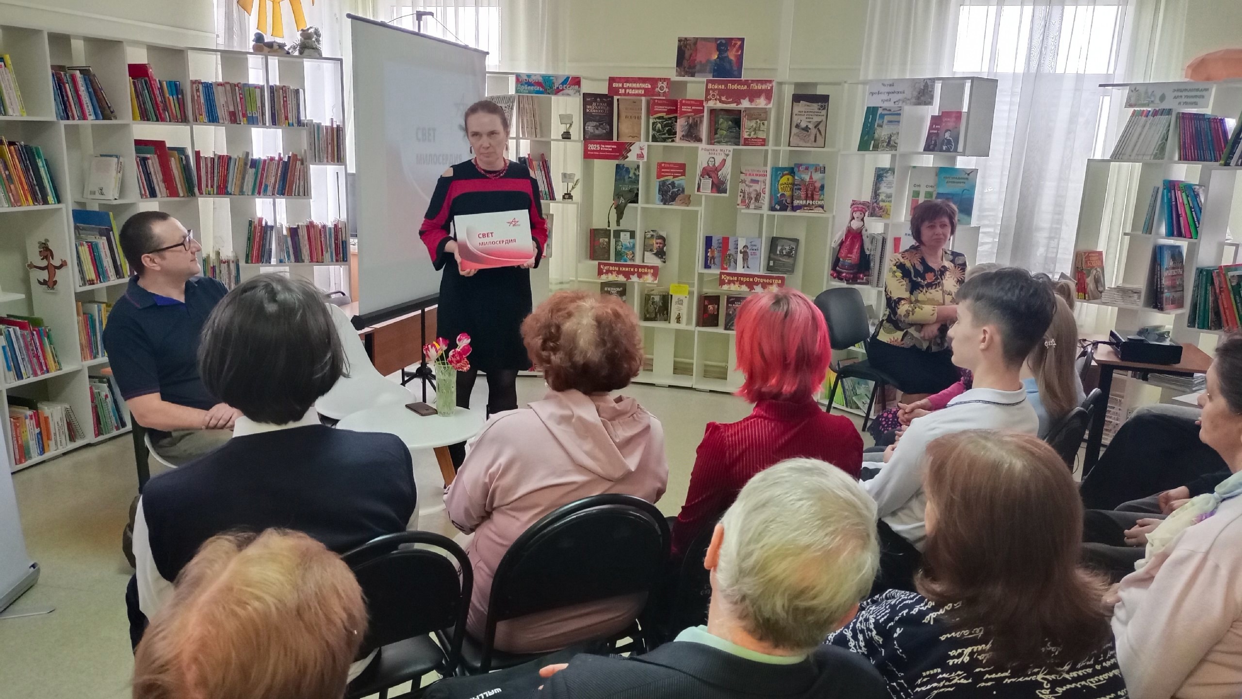 В Майской библиотеке состоялась презентация книги «Свет милосердия».