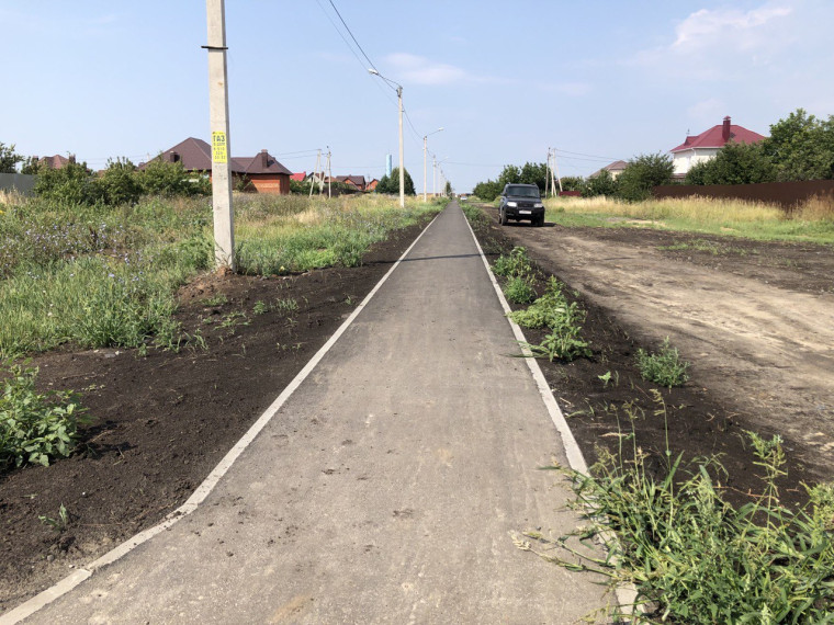 В микрорайоне «Тавровский» села Никольское завершилось устройство тротуара.