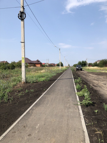 В микрорайоне «Тавровский» села Никольское завершилось устройство тротуара.